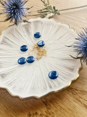 Bouton bleu saphir brillant